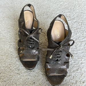 Coach high heels. Size 8.5B  Look at bottom of heels, inside of shoe looks new